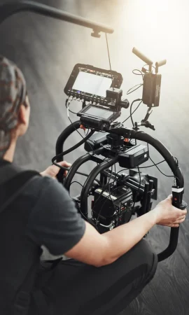 photographer-camera-filming-with-stabilizing-rig-set-photography-media-magazine-cameraman-focus-person-backstage-shooting-production-equipment-as-director-with-lens