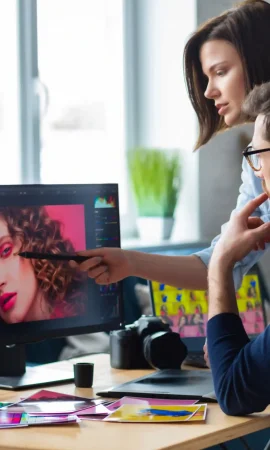 photographer-graphic-designer-working-office-with-laptop-monitor-graphic-drawing-tablet-color-palette